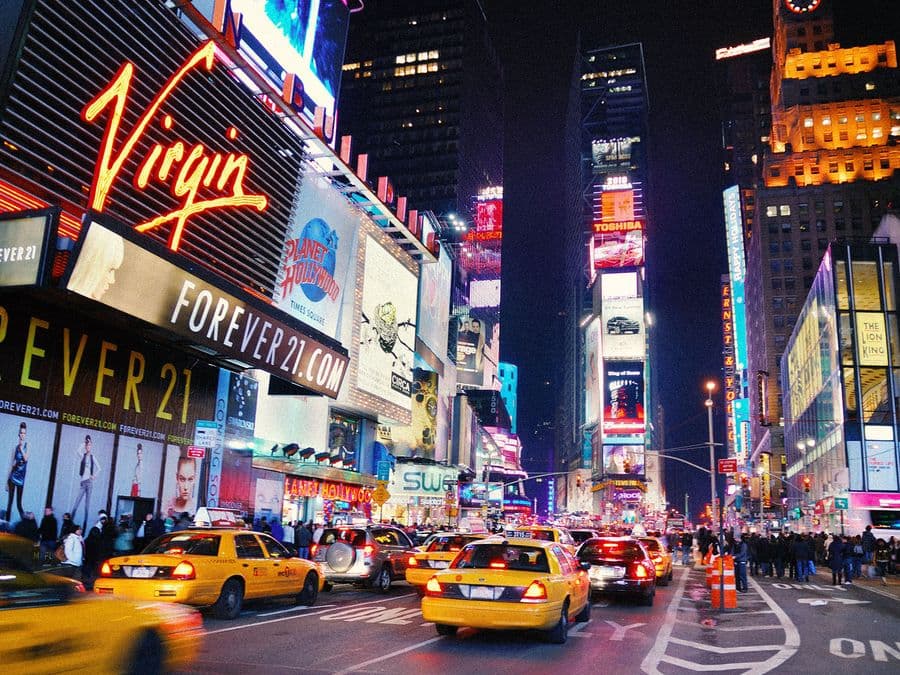 Yellow taxis in Times Square, New York, at night