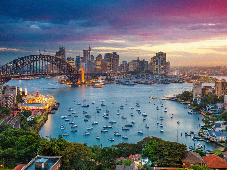 Sydney Harbour Bridge and skyline at sunset