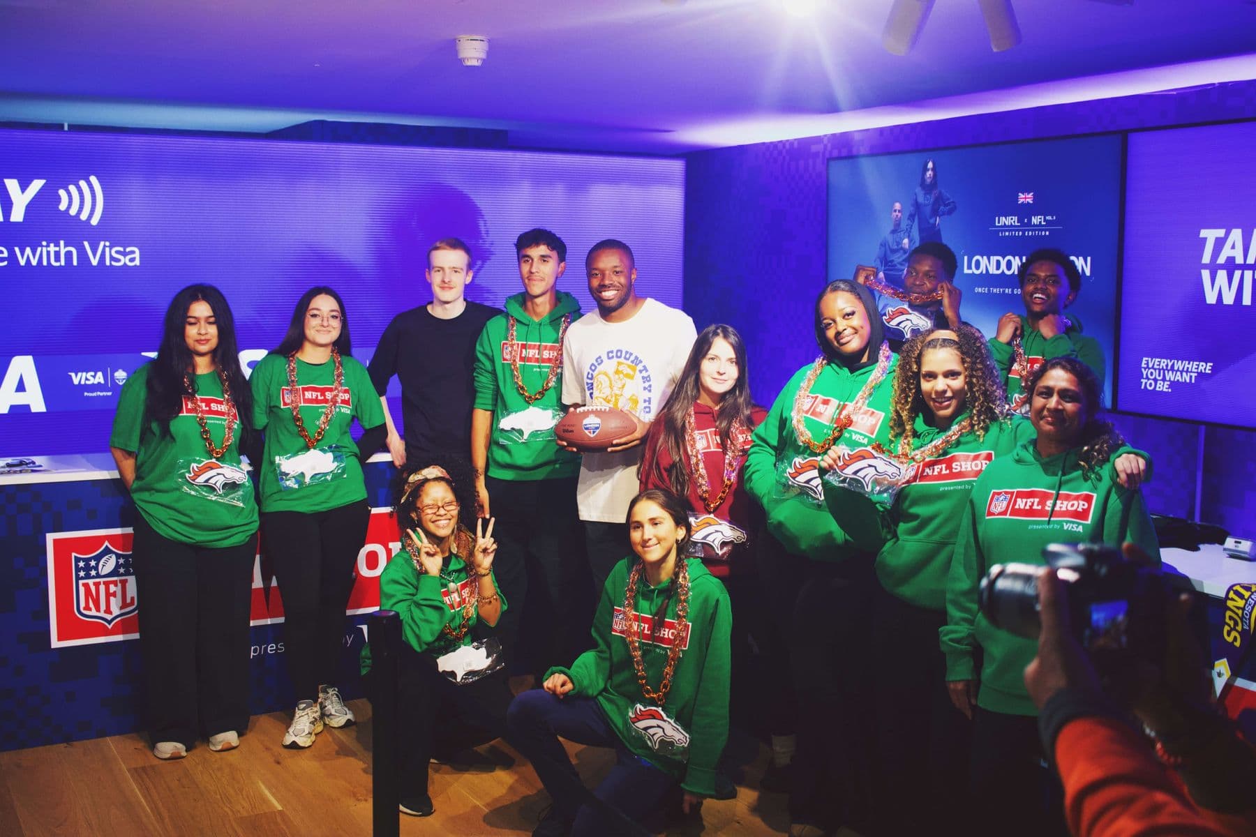 Teliporter People team in NFL shop t-shirts at the NFL London activation